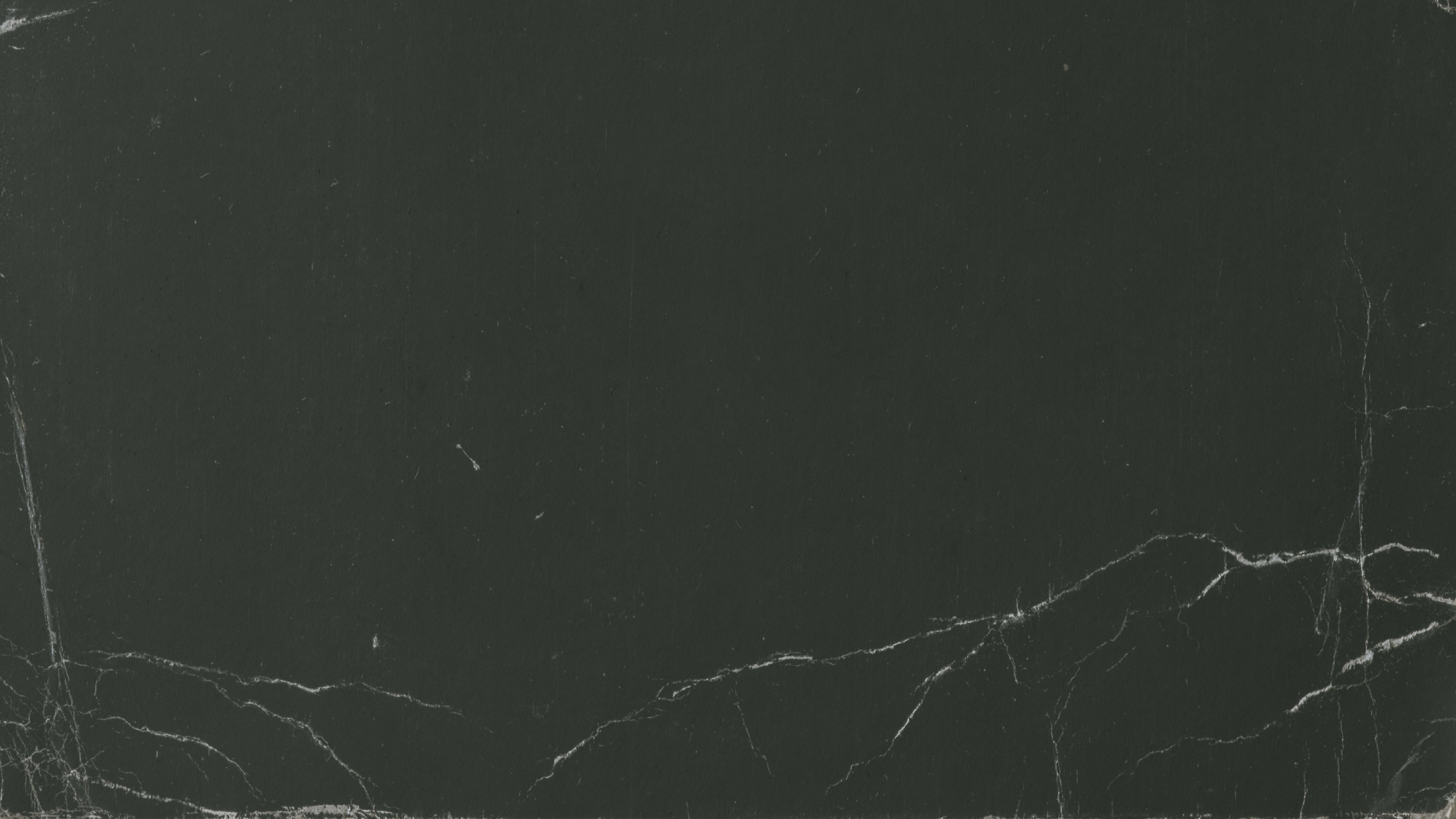 Dark green book cover paper texture with tearings and crimple marks